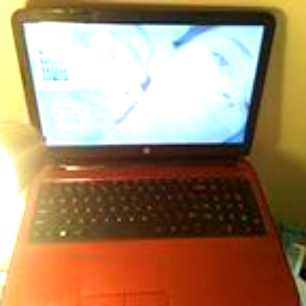 HP Red Laptop with Numeric Keypad and Widescreen Display
